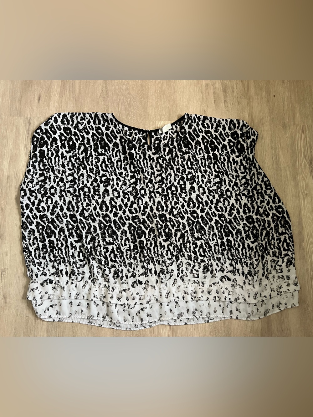 Ava & Viv Black and White Animal Print Sleeveless Top 4X tiered hem
